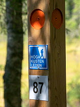 High Coast Path waymarker. Skuleskogen National Park, High Coast World Heritage Site, Vasternorrland, Sweden. August, 2018.