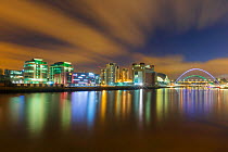 Millenium Bridge illuminated at dusk, River Tyne, Newcastle, Tyne and Wear, England. February 2013