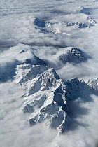 Aerial view of Julian Alps with cloud cover, Slovenia, January 2014.
