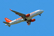 EasyJet Airbus A320-214 WL, commercial passenger twin-engine jet airliner in flight against blue sky, Brussels Airport, Belgium, May 2018