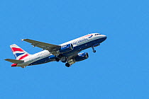 British Airways Airbus A319-131, narrow-body, commercial passenger twin-engine jet airliner in flight against blue sky, Brussels Airport, Belgium, May 2018