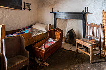 Bedroom in the Croft House Museum restored 19th century cottage at Boddam, Dunrossness, Shetland Islands, Scotland, UK, May 2018