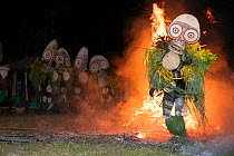 Traditional Baining Fire Dance. Performed by men from the Baining tribe who enter a trance like state and dance around and through the fire in masks thought to resemble insects to contact the spirit w...