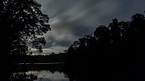 Timelapse from day to night looking over Lake Eacham, Atherton Tablelands, Wet Tropics World Heritage Area, North Queensland, Australia, 2015.