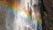 Close-up shot of Wallaman Falls, with rainbow, Wet Tropics World Heritage Area, Ingham, Queensland, Australia. 2017.