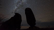 Timelapse from day to night of Balancing Rock, with stars and the Milky Way and clouds, Chillagoe, North Queensland, Australia. 2015.
