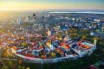 Tallinn city wall and old town, UNESCO World Heritage Site. New town and Lake Ulemiste beyond. In evening light. Harjumaa, Estonia. May 2011.