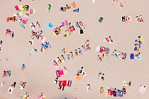 People sunbathing on beach. Parnu, the summer capital of Estonia. Parnumaa, Western Estonia. July 2010.