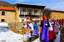 Men in colourful costumes at Carnival of Zamarrones, Santa Eulalia village, Polaciones valley, Cantabria, Spain. February 2013.