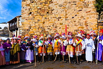 Men in colourful costumes at Carnival of Zamarrones, Belmonte village, Polaciones valley, Cantabria, Spain. February 2013.