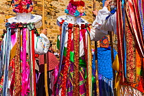 Men in colourful costumes at Carnival of Zamarrones, Belmonte village, Polaciones valley, Cantabria, Spain.