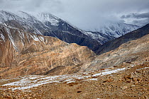 Mountain ranges with snow seen from around Nako village, in Hangrang valley, near the Indo-China (Tibet) border, Himalaya mountains, Kinnaur, Himachal Pradesh, India