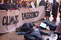Extinction Rebellion protestors lying down in protest. Carmarthen ,Wales, December 2018.