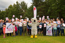Group of people protesting to raise awareness of Hen harrier (Circus cyaneus) persecution on Grouse moors. Boat of Garten, Cairngorms National Park, Scotland, UK. August 2017.