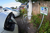 Electric cars charging at Findhorn Foundation, Moray, Scotland, UK.