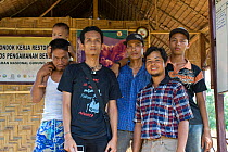 Sumatran Orangutan Society Staff, Rainforest Rehabilitation Team. North Sumatra, Indonesia.