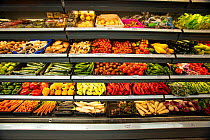 Various fruit and vegetables on display in a super market, North London, England, UK.