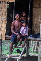 Batak people outside house, South Palawan, the Philippines. September 2017