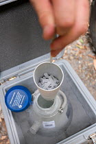 Collected by Dr. Raymond Dempsey from the canopy of trees in the Daintree rainforest, leaf disks are frozen to be taken to the JCU lab for futher processing and analysis. Daintree Rainforest, Queensla...