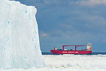 Mary Arctica cargo ship in Atka Bay with ice shelf and sea ice in foreground. Atka Bay, Antarctica. February 2017.