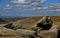 Perched boulder of Carboniferous age Millstone Grit on the western edge of the Kinder Scout plateau. Derbyshire, UK, September