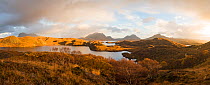 Mountains of Assynt and Loch Sionasgaig in the rain, Sutherland, Scotland, UK. November.