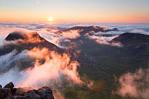 Evening view from Askival mountain over inversion layer and the Atlantic corrie, Isle of Rum, Hebrides, Scotland, UK, September.