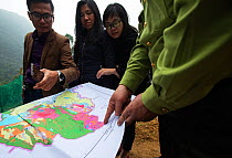 Fauna and Flora International Staff and government official looking at the site of a new reserve to protect a new population of critcally endangered Delacour's langurs (Trachypithecus delacouri) Kim B...
