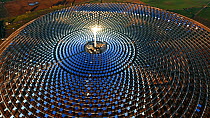 Aerial shot of the Gemasolar Thermosolar Plant owned by Torresol Energy, it uses molten salt as its heat transfer fluid and energy storage medium to produce energy for up to 24 hours a day, Seville, S...