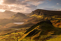 The Quiraing bathed in morning light, eastern face of Meall na Suiramach, the northernmost summit of the Trotternish on the Isle of Skye, Scotland, UK. November 2017.