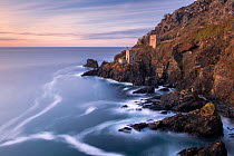 The Crown&#39;s Engine Houses at Botallack, high tide at sunset, West Cornwall, UK. September 2018.