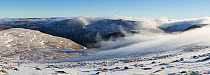 View across Cairngorm plateau to Beinn Mheadhoin in winter, Cairngorms National Park, Scotland, UK., December