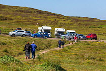 Car park and people on footpath, Achnahaird Bay, Coigach and Assynt Living Landscape, Scotland, UK.July