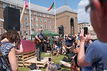 Campaigner Billy Bragg singing at Extinction Rebellion rally. Bristol, England, UK. 16 July 2019.
