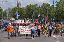 Extinction Rebellion climate change protesters marching through city centre. Bristol, England, UK. 16 July 2019.