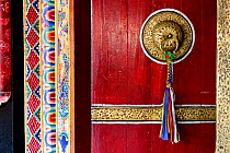 Old door of Rumtek, a Kagyu monastery near Gangtok in Sikkim. It is the largest monastery in Sikkim. India, October 2018.