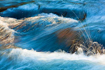 Water flowing out of the Hyalite Resevoir, Hyalite Creek, Gallatin National Forest, Bozeman, Montana, USA. March
