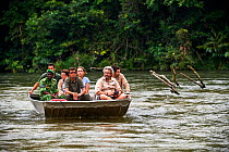 Beauval Zoo team travelling on boat to observe female Western lowland gorillas (Gorilla gorilla gorilla) on habituation island following their release. Reintroduction through Gorilla Protection Projec...