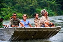 Beauval Zoo team travelling on boat to observe female Western lowland gorillas (Gorilla gorilla gorilla) on habituation island following their release. Reintroduction through Gorilla Protection Projec...