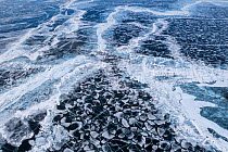 Ice with cracks on Lake Baikal, aerial shot. Photographed for The Freshwater Project extended. Near Khuzhir, Olchon Island, Irkutsk Oblast and Buryat Republic, Siberia, Russia. February 2019.