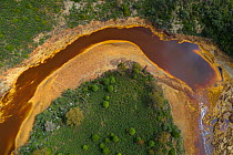 Meander of Rio Tinto, an acidic river with high iron levels resulting in red and orange colours. Aerial view. Photographed for The Freshwater Project extended. Andalucia, Spain. April 2019.