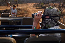 Photographer Marie-Noelle Bertiere on safari., Zimanga Private Nature Reserve, KwaZulu Natal, South Africa