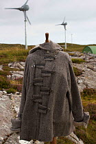 Manequin with high quality woollen cape, made from tweed from local machair grazing sheep. Scotland, UK, July.