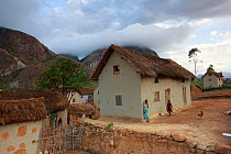 Village in Anja Community Reserve with granite mountain in background. Madagascar. 2018.