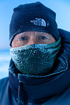 Wildife photographer Ingo Arndt in winter clothing, portrait. Lake Baikal, Siberia, Russia. February 2019.