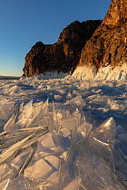 Ice and rocks on shore of Lake Baikal. Siberia, Russia. February 2019.