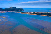 Santona, Victoria and Joyel Marshes Natural Park. Aerial view of estuary out to the Cantabrian Sea. Cantabria, Spain. March 2019.