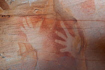 Wandjina Aboriginal rock art, depiction of hands of the Wunambal Gaambera / Uunguu people. Wary Bay, Bigge Island, Bonaparte Archipelago, The Kimberley, Western Australia. 2015.