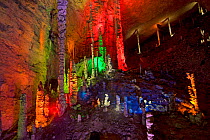 Huanglong / Yellow Dragon Cave stalagmites in colourful lighting. Hunan Province, China. 2010.