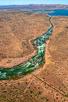 Spillway diverting water during high flow event. Lake Argyle reservoir, dammed in 1971 for Ord River Irrigation Scheme. The Kimberley, Western Australia. 2017.